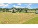 Farmland with a home, black fence, and farm equipment at 12000 S Highway 475, Ocala, FL 34480