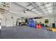 Spacious garage with overhead storage and epoxy flooring at 12000 S Highway 475, Ocala, FL 34480