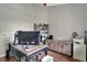 Bright home office features built-in shelving and wood flooring at 12000 S Highway 475, Ocala, FL 34480