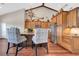 Kitchen with wood cabinets, granite countertops, and stainless steel appliances at 12000 S Highway 475, Ocala, FL 34480
