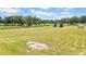 Horse property featuring a large paddock with black fencing at 12000 S Highway 475, Ocala, FL 34480