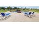 Inviting swimming pool with a stone waterfall feature at 12000 S Highway 475, Ocala, FL 34480