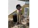 Close-up of Puronics water filter and pressure tank at 14351 Se 34Th Ct, Summerfield, FL 34491