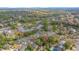 Aerial view showcasing the home's setting and surrounding landscape at 2021 Se Twin Bridge Cir, Ocala, FL 34471