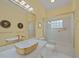Updated bathroom with a gold vessel sink and shower at 2021 Se Twin Bridge Cir, Ocala, FL 34471