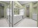 Spacious bathroom with double vanity and shower at 2021 Se Twin Bridge Cir, Ocala, FL 34471