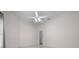 Spacious bedroom with ceiling fan and tile floor at 2021 Se Twin Bridge Cir, Ocala, FL 34471