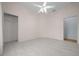 Bedroom with ceiling fan and tile flooring at 2021 Se Twin Bridge Cir, Ocala, FL 34471