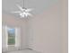 Spacious bedroom with ceiling fan and window coverings at 2021 Se Twin Bridge Cir, Ocala, FL 34471