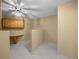 Bonus room with built-in cabinets and carpet at 2021 Se Twin Bridge Cir, Ocala, FL 34471