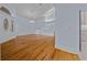 Bright dining room with hardwood floors and chandelier at 2021 Se Twin Bridge Cir, Ocala, FL 34471