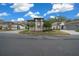 Single story home with manicured landscaping and driveway at 2021 Se Twin Bridge Cir, Ocala, FL 34471