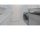 Laundry room with washer, dryer and sink at 2021 Se Twin Bridge Cir, Ocala, FL 34471