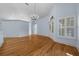 Bright living room with hardwood floors and chandelier at 2021 Se Twin Bridge Cir, Ocala, FL 34471