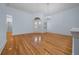 Spacious living room with hardwood floors and chandelier at 2021 Se Twin Bridge Cir, Ocala, FL 34471