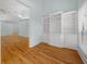 Bright office space with built-in shelving and hardwood floors at 2021 Se Twin Bridge Cir, Ocala, FL 34471