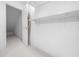 Unfinished storage area with shelving at 2021 Se Twin Bridge Cir, Ocala, FL 34471