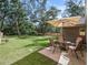 A large backyard offers lots of space for outdoor activities at 205 Brevard Ave, Lady Lake, FL 32159