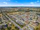 Aerial view showing home's location in a community with golf course at 2997 Teasdale Ter, The Villages, FL 32163