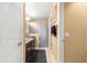 Clean bathroom with granite countertop, shower, and ample storage at 2997 Teasdale Ter, The Villages, FL 32163
