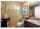 Clean bathroom with granite countertop and updated fixtures at 2997 Teasdale Ter, The Villages, FL 32163