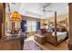 Primary bedroom featuring a large bed and ample natural light at 2997 Teasdale Ter, The Villages, FL 32163
