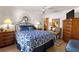 Spacious bedroom with a large bed and ample furniture at 2997 Teasdale Ter, The Villages, FL 32163