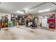 Garage with golf cart, washer, dryer, and storage at 2997 Teasdale Ter, The Villages, FL 32163