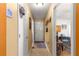 Bright hallway with neutral color palette and tile flooring at 2997 Teasdale Ter, The Villages, FL 32163