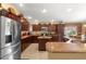 Modern kitchen featuring stainless steel appliances and granite countertops at 2997 Teasdale Ter, The Villages, FL 32163