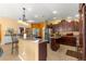 Well-equipped kitchen with granite countertops and ample cabinet space at 2997 Teasdale Ter, The Villages, FL 32163