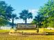 Community entrance sign 'Oak Hill Plantation' surrounded by lush landscaping at 3168 Ne 46Th Ave, Ocala, FL 34470