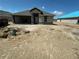 Single Gathering house under construction featuring an open garage, neutral colors, and craftsman-style design under a blue sky at 3168 Ne 46Th Ave, Ocala, FL 34470