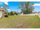 Spacious backyard with grassy area and privacy fence at 3707 Se 24Th St, Ocala, FL 34471
