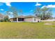 Large backyard with screened porch and home view at 3707 Se 24Th St, Ocala, FL 34471