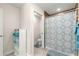 Bathroom with shower/tub combo and a patterned shower curtain at 3707 Se 24Th St, Ocala, FL 34471