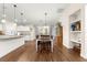 Bright dining area with hardwood floors and a wooden dining table at 3707 Se 24Th St, Ocala, FL 34471
