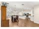 Open concept dining area with hardwood floors and kitchen access at 3707 Se 24Th St, Ocala, FL 34471