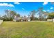 House with large grassy front yard and driveway at 3707 Se 24Th St, Ocala, FL 34471