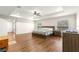 Spacious main bedroom with hardwood floors and ceiling fan at 3707 Se 24Th St, Ocala, FL 34471