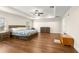 Large bedroom with hardwood floors and ample space at 3707 Se 24Th St, Ocala, FL 34471