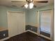 This bedroom offers a ceiling fan, neutral paint, window for natural light, and closet for easy storage at 3752 Se 130Th St, Belleview, FL 34420