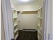 Walk-in closet with custom shelving at 3752 Se 130Th St, Belleview, FL 34420