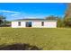 New construction home showcasing a large backyard at 4424 Se 137Th Pl, Summerfield, FL 34491