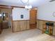 View of dining area, bathroom, and back door access at 4960 Se 17Th St, Ocala, FL 34471