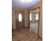 Bright entryway with tile flooring and access to living areas at 4960 Se 17Th St, Ocala, FL 34471