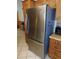 Stainless steel refrigerator in a classic kitchen setting at 4960 Se 17Th St, Ocala, FL 34471