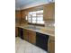 Kitchen with stainless steel sink and dishwasher at 4960 Se 17Th St, Ocala, FL 34471