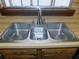 Clean stainless steel sink with three basins at 4960 Se 17Th St, Ocala, FL 34471