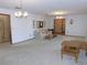Spacious living room with hardwood floors and neutral decor at 4960 Se 17Th St, Ocala, FL 34471